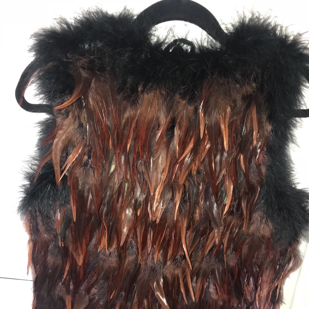 FEATHER VEST